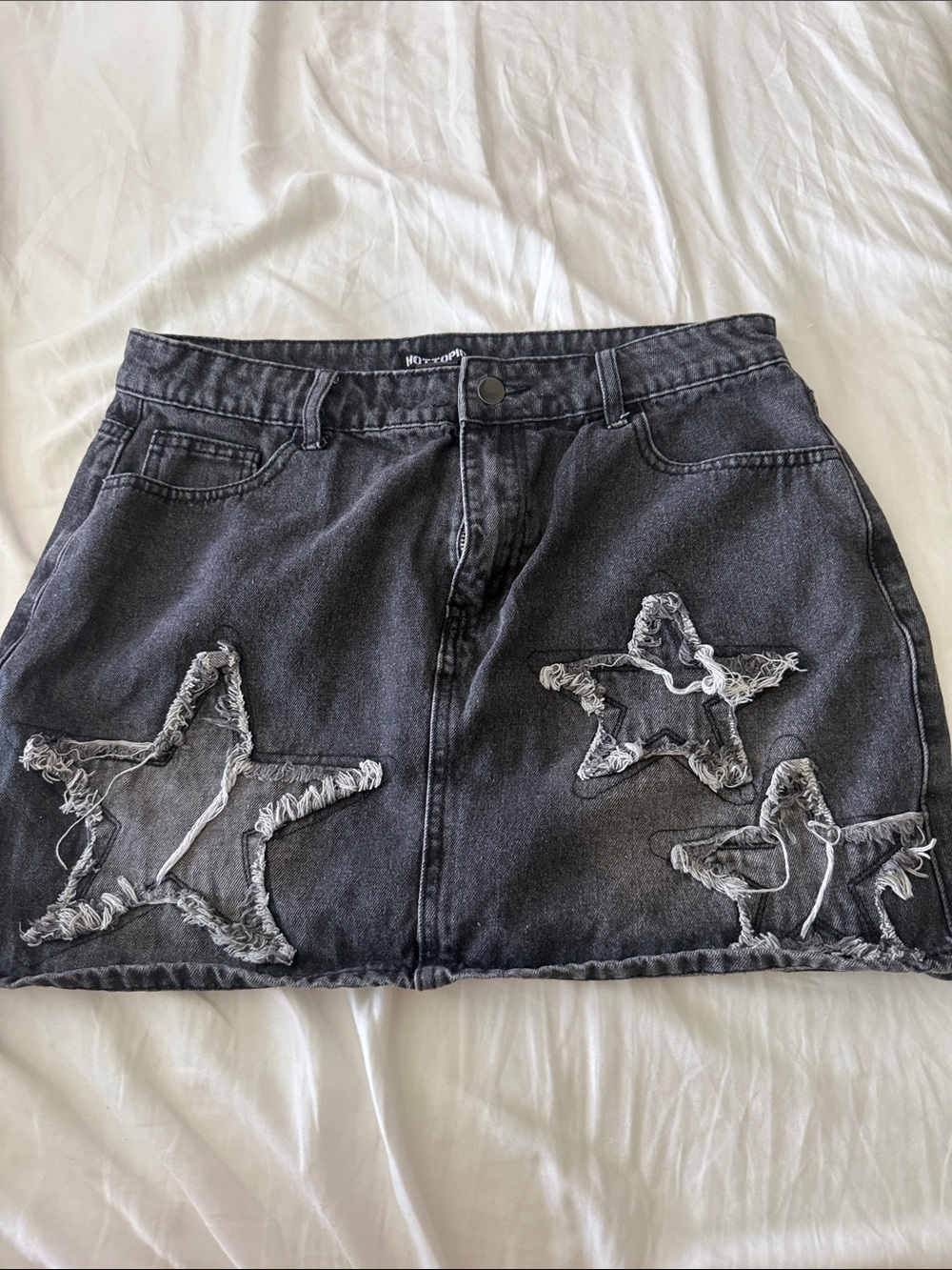 Black Distressed Star Denim Mini Skirt from hot topic